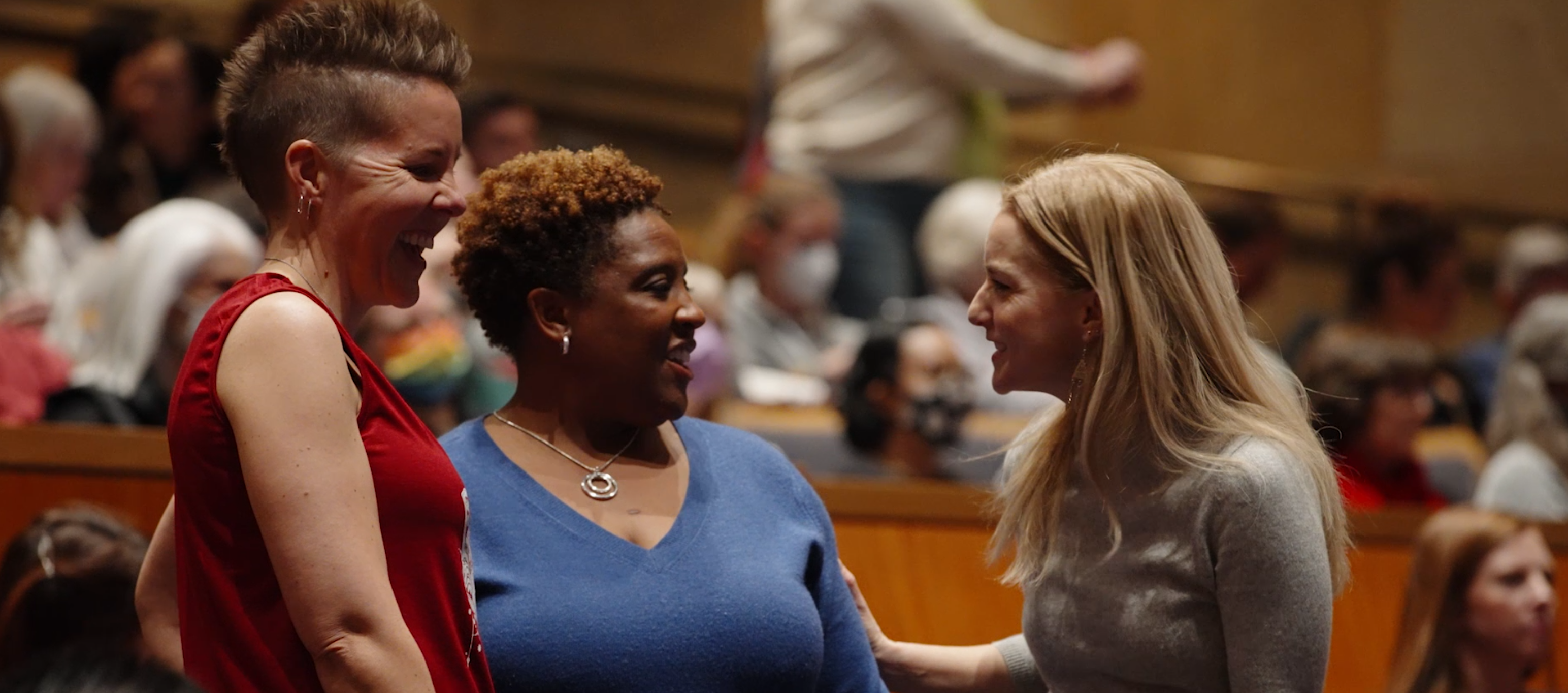 Image of patrons talking together in jackson hall